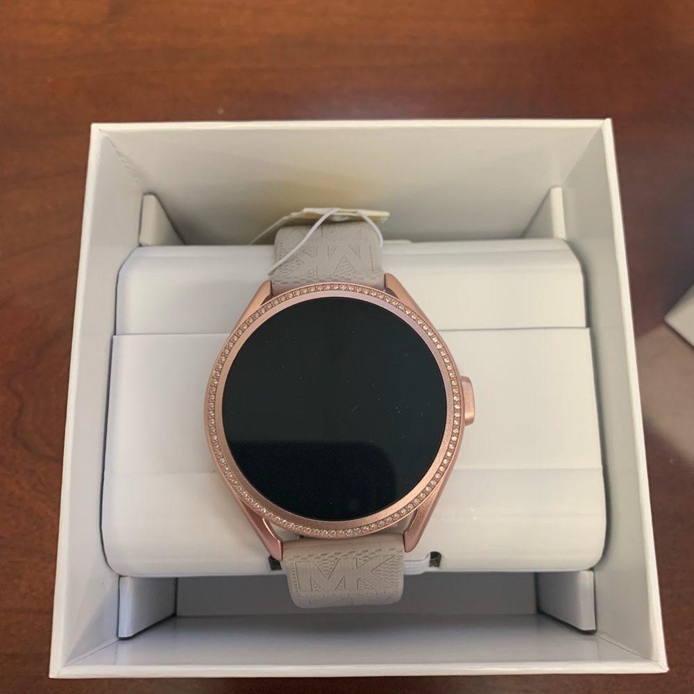 Michael Kors Access Gen 5E MKGO pink tone and logo smartwatch